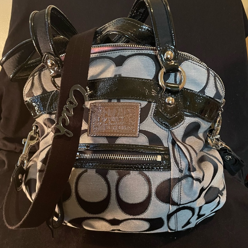 Coach Purse, New never used, Black/ Silver with Pink Lining